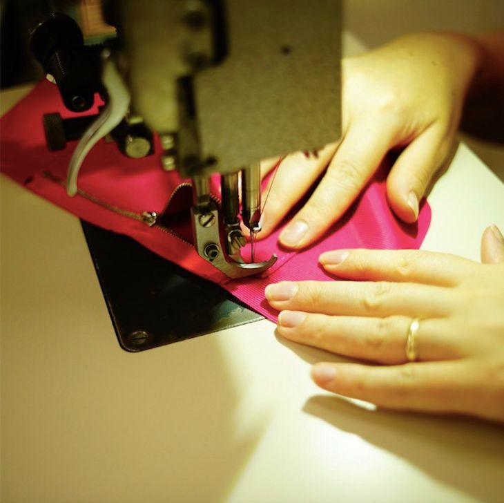 Seamstress at work on fabric